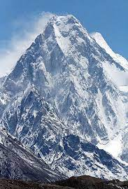 K2: The Savage MountainK2 is located in the Karakoram Range of Pakistan, and it has a peak elevation of 8,611 meters (28,251 feet).K2 is known as the "Savage Mountain" because it is one of the most difficult mountains to climb. The ascent is technically challenging, and the weather conditions are often harsh