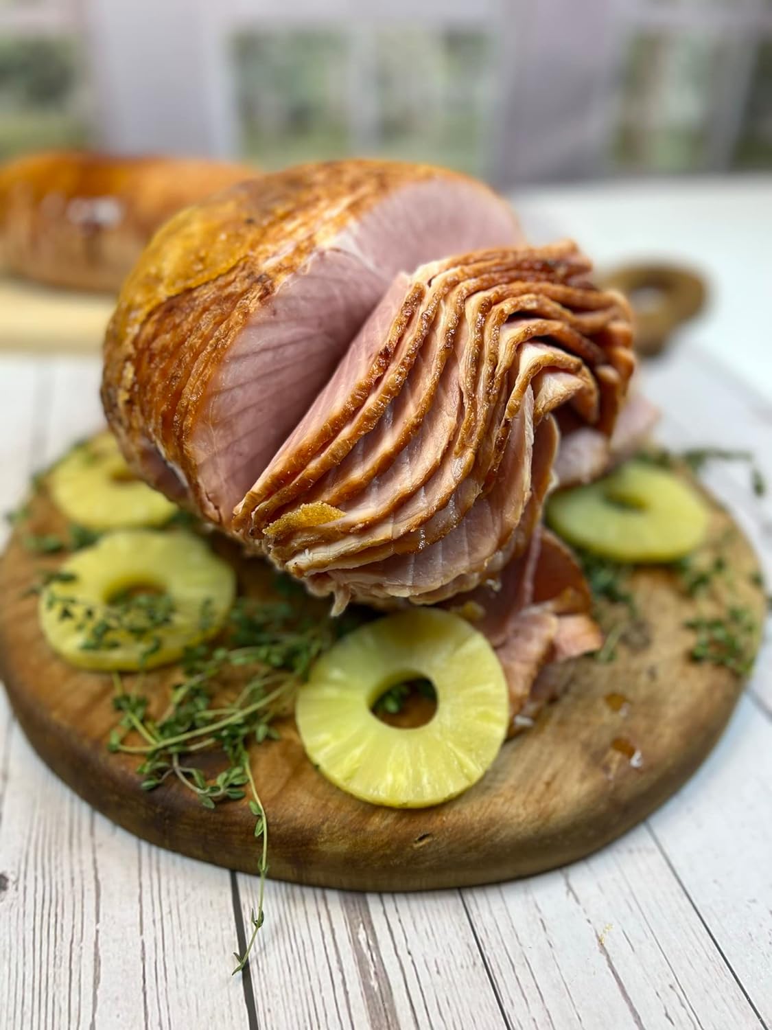 Honey Glazed Spiral Sliced Holiday Ham. 8-9 pounds. Serves 16-18.