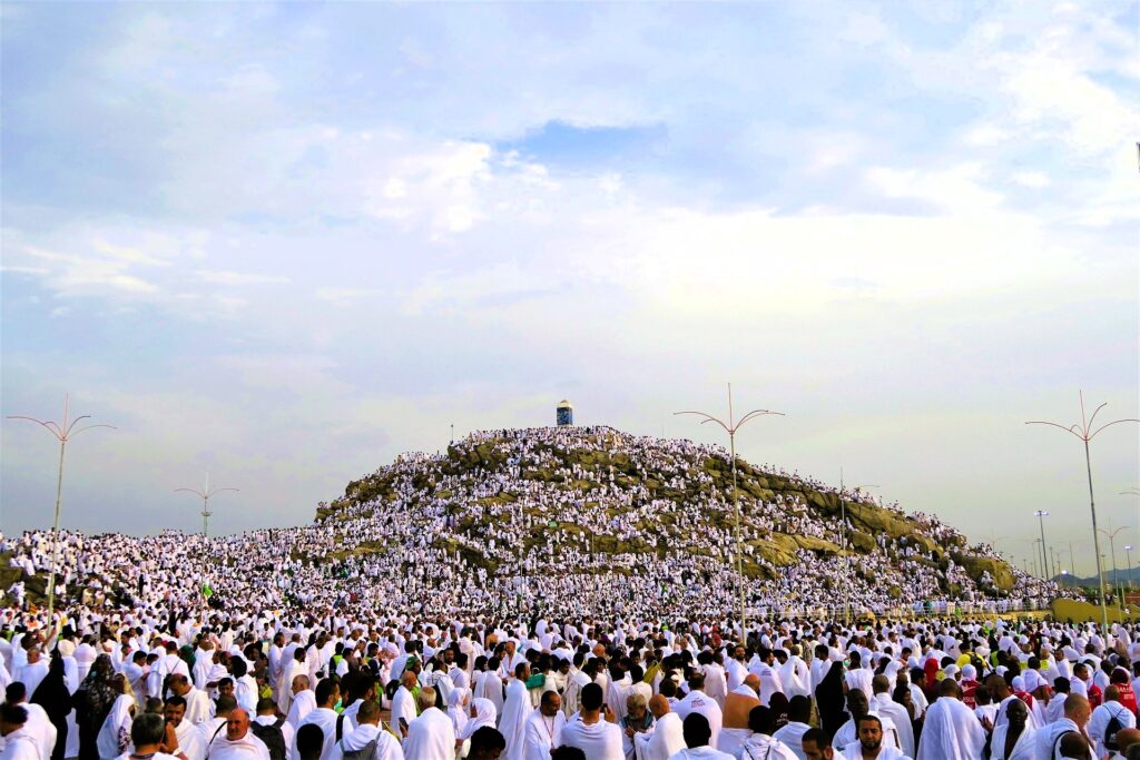 Pilgrims praying at Mount Arafat during Hajj