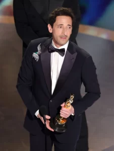 Adrien Brody accepts the best actor award for "The Brutalist