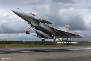 A French multirole fighter aircraft Rafale takes off while practicing a simulated landing on a aircraft carrier at the French Navy airbase of Landivisiau in Saint-Servais, western France on April 16, 2025. (Photo by Fred TANNEAU / AFP) (Photo by FRED TANNEAU/AFP via Getty Images)