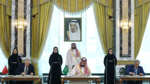 Makkah Defence Pact:Leaders of Turkey, Pakistan, and Saudi Arabia sign a mutual defence pact. [Getty]