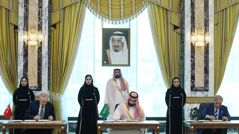 Makkah Defence Pact:Leaders of Turkey, Pakistan, and Saudi Arabia sign a mutual defence pact. [Getty]